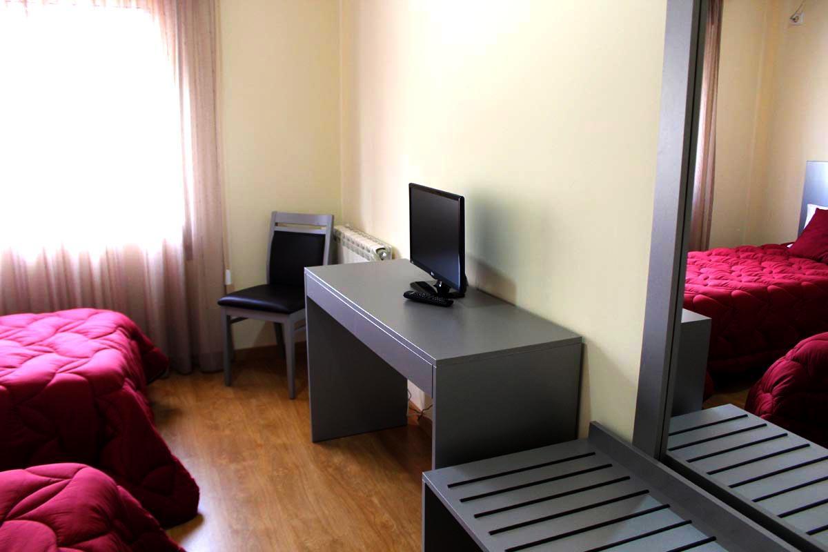 Quarto Duplo com 2 Camas Individuais